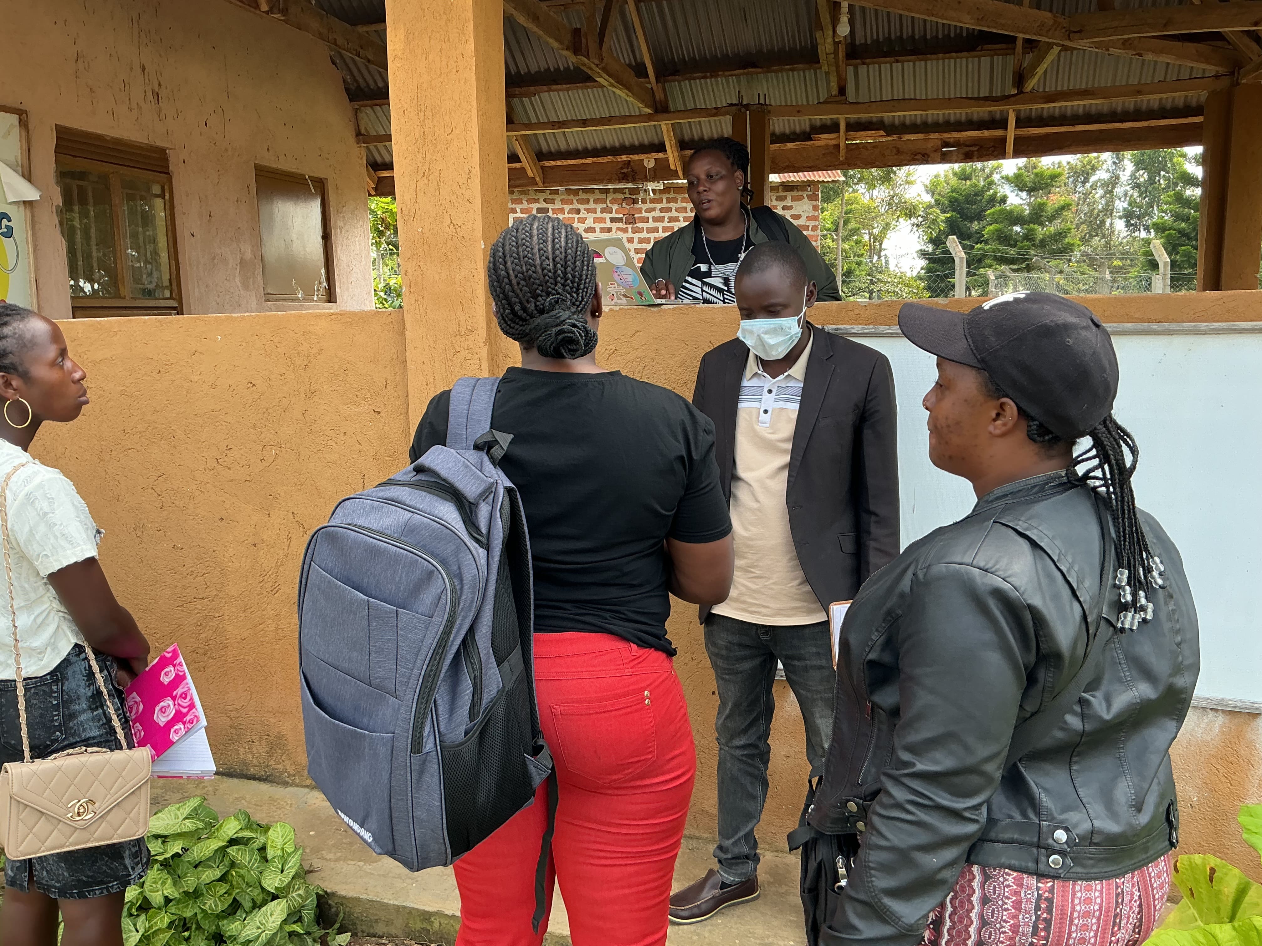 JEEWAG staff conducting a breif meeting before engaging with Heaith workers at Koja H/C III.