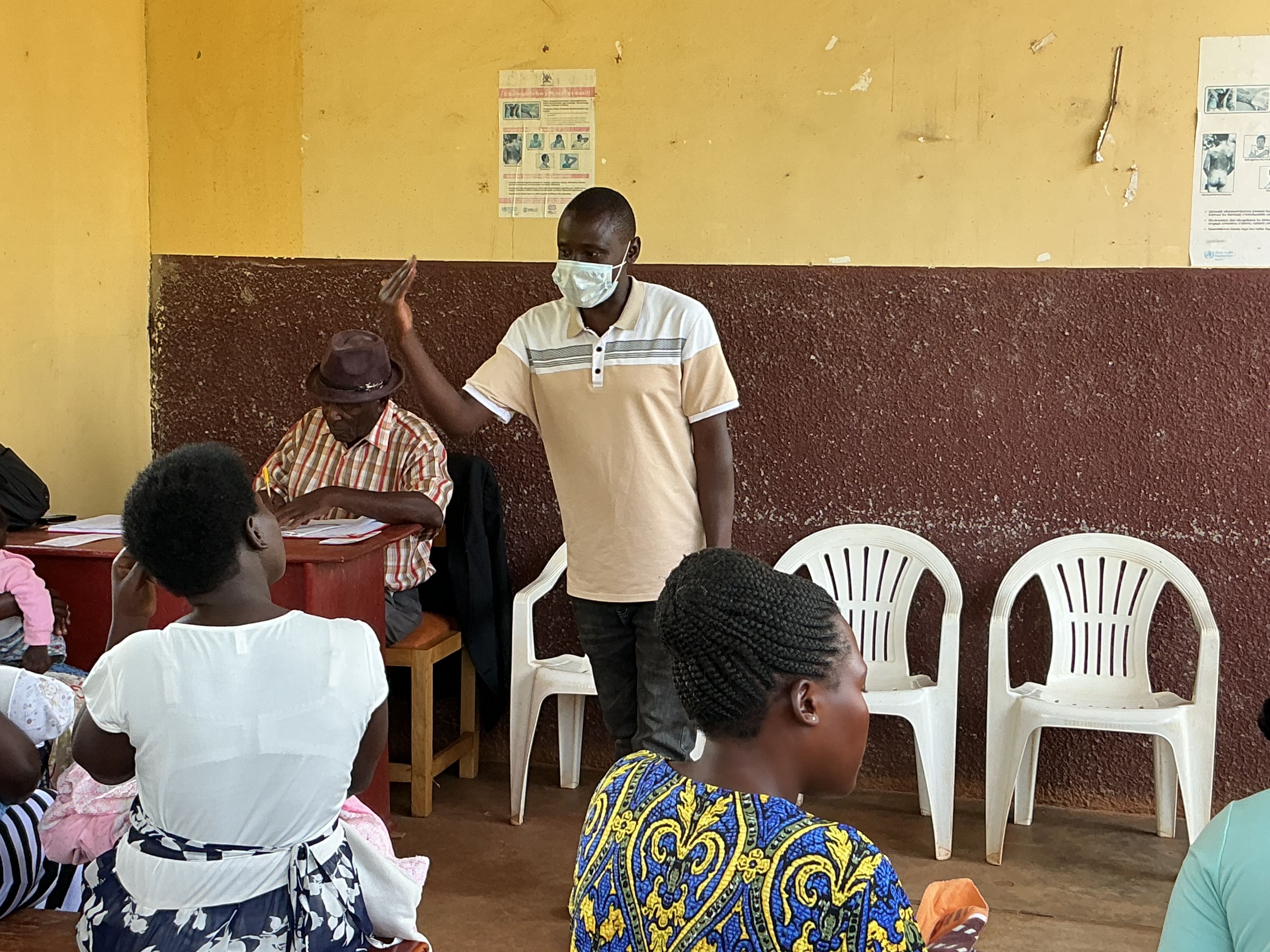 Jeewag M&E Conducting a feed meeting with communtity members at Mpunge H/C III.
